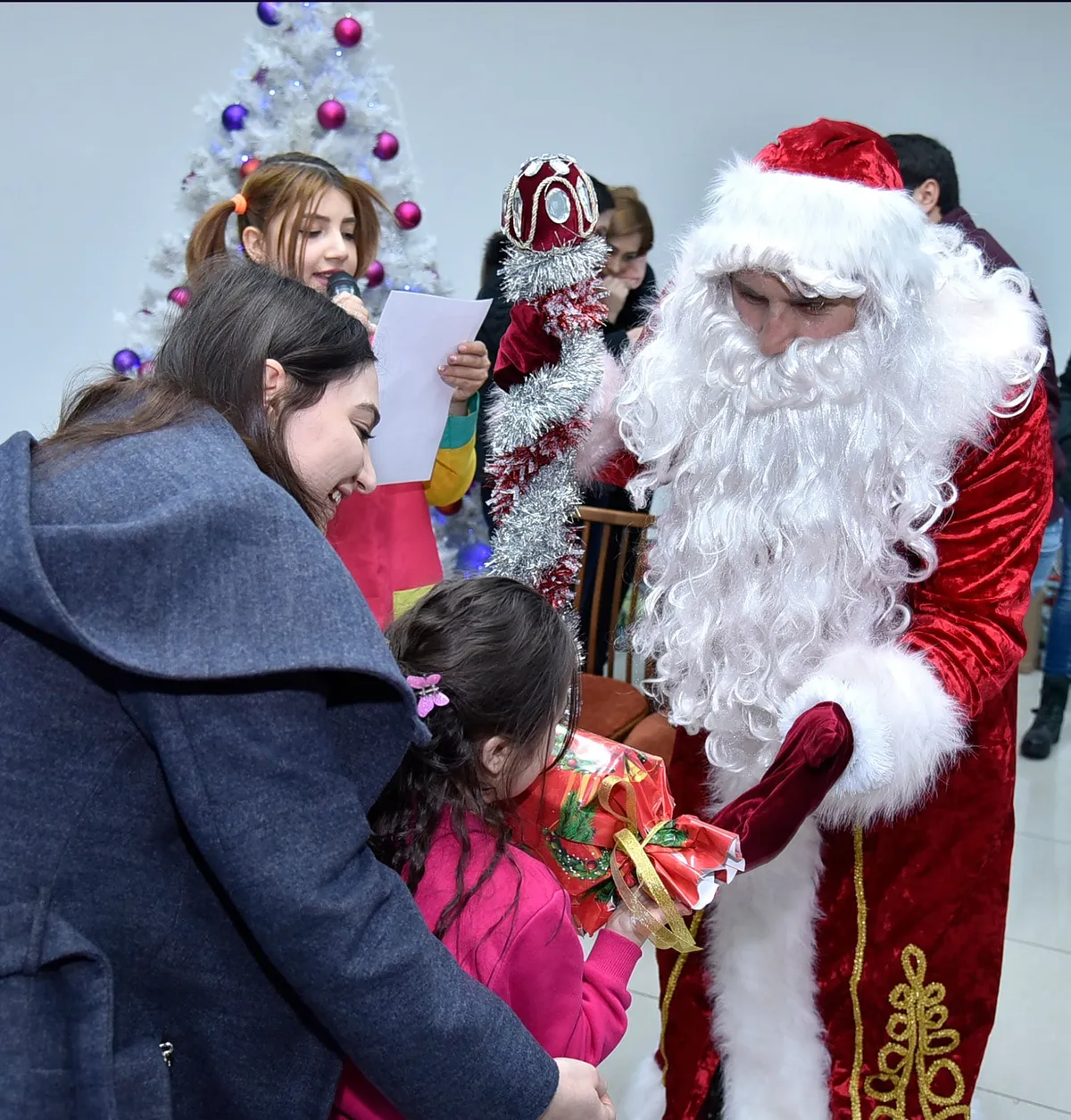 Santa Claus and kids in need